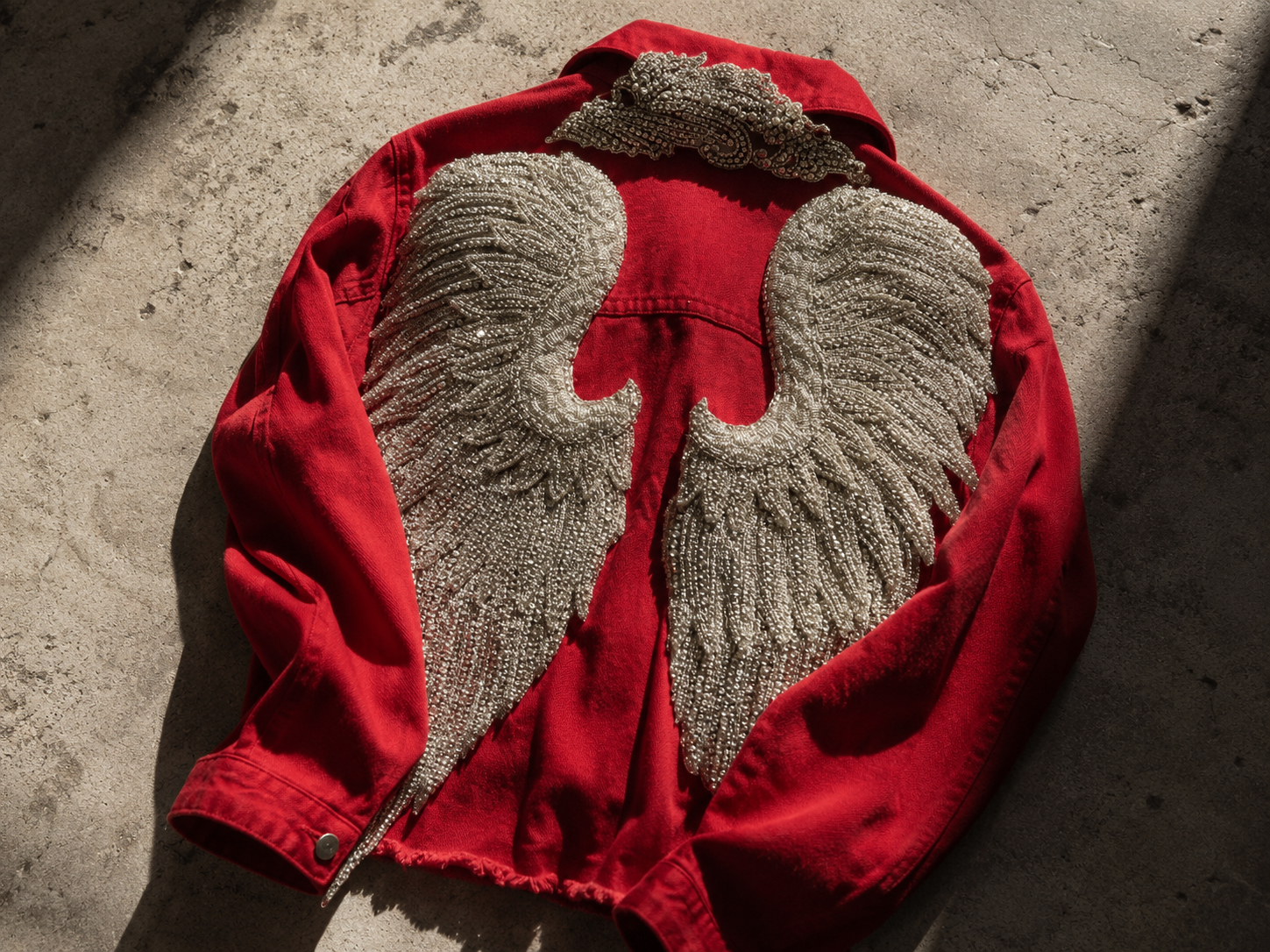 Nemesis Jacket by Santana Luxe Label — red denim jacket with crystal embellished sculptural wings